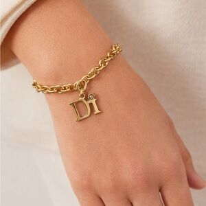 Diamonds International DI Gold Tone Charm Bracelet
